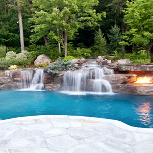 waterfall into pool with landscaping