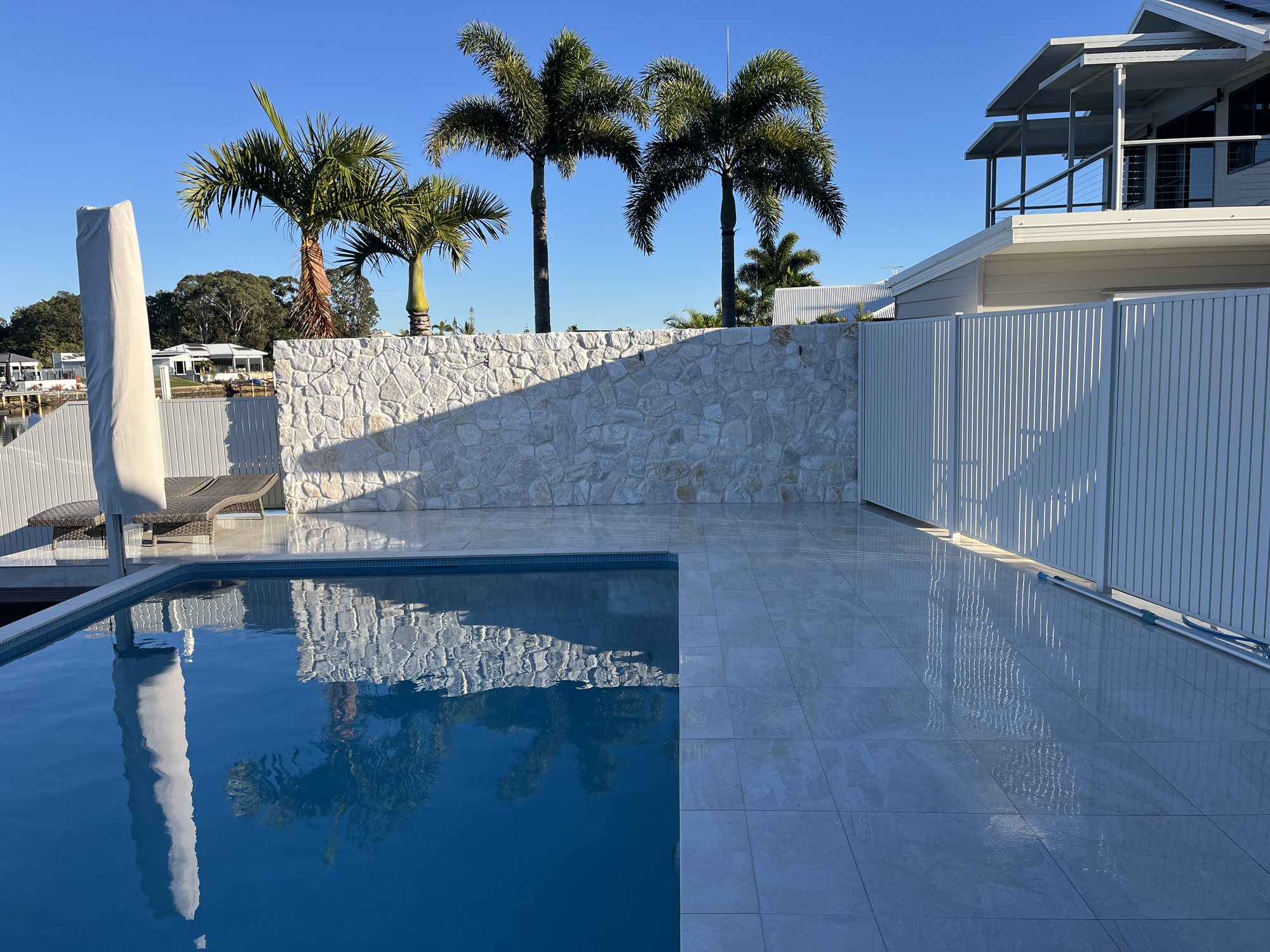 Natural stone clad pool wall – Stone Cladding Sunshine Coast Natural stone clad pool wall - Stone Cladding Sunshine Coast