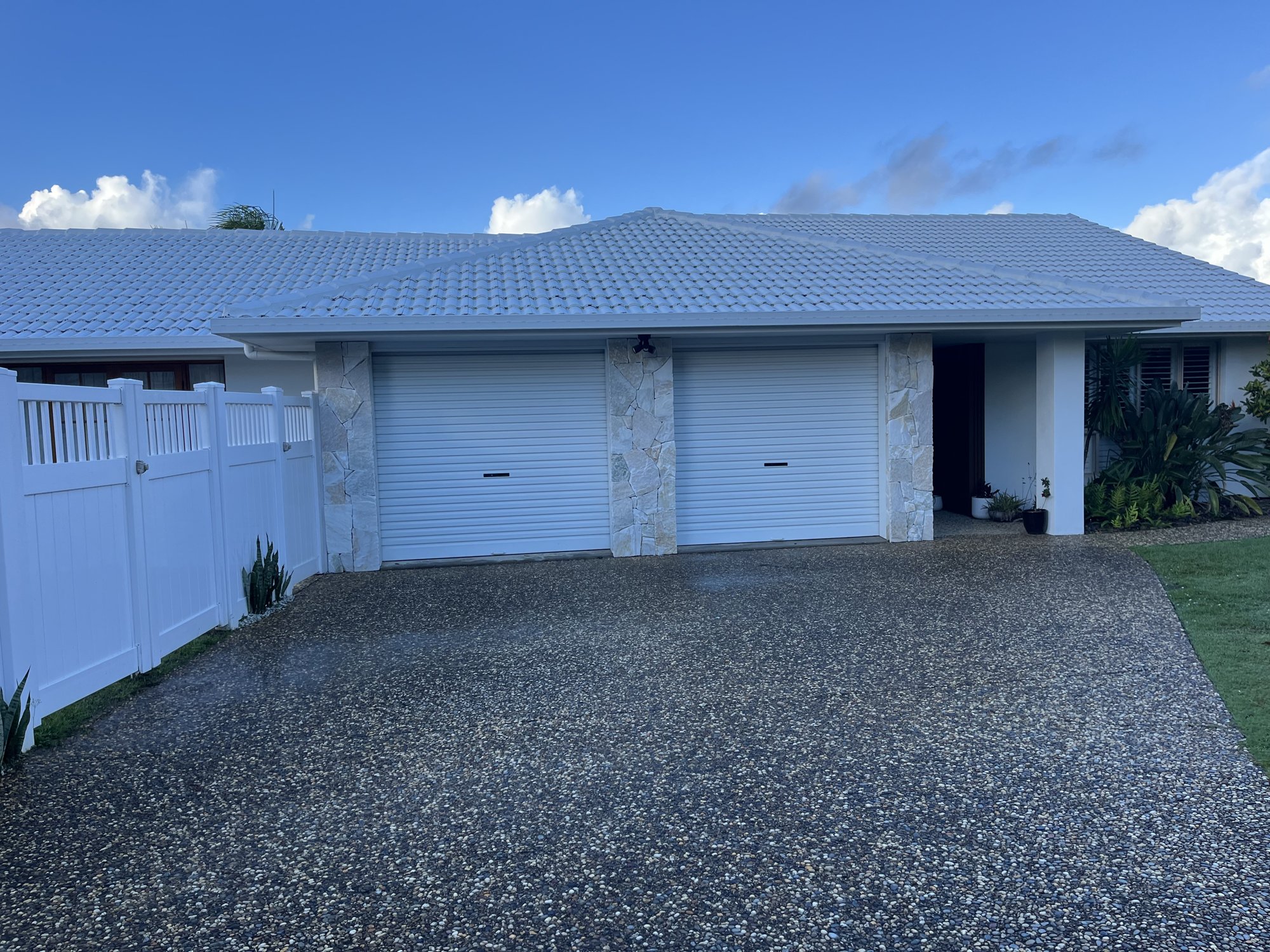 Stone cladding on garage pillars of a single-storey home - Sunshine Coast