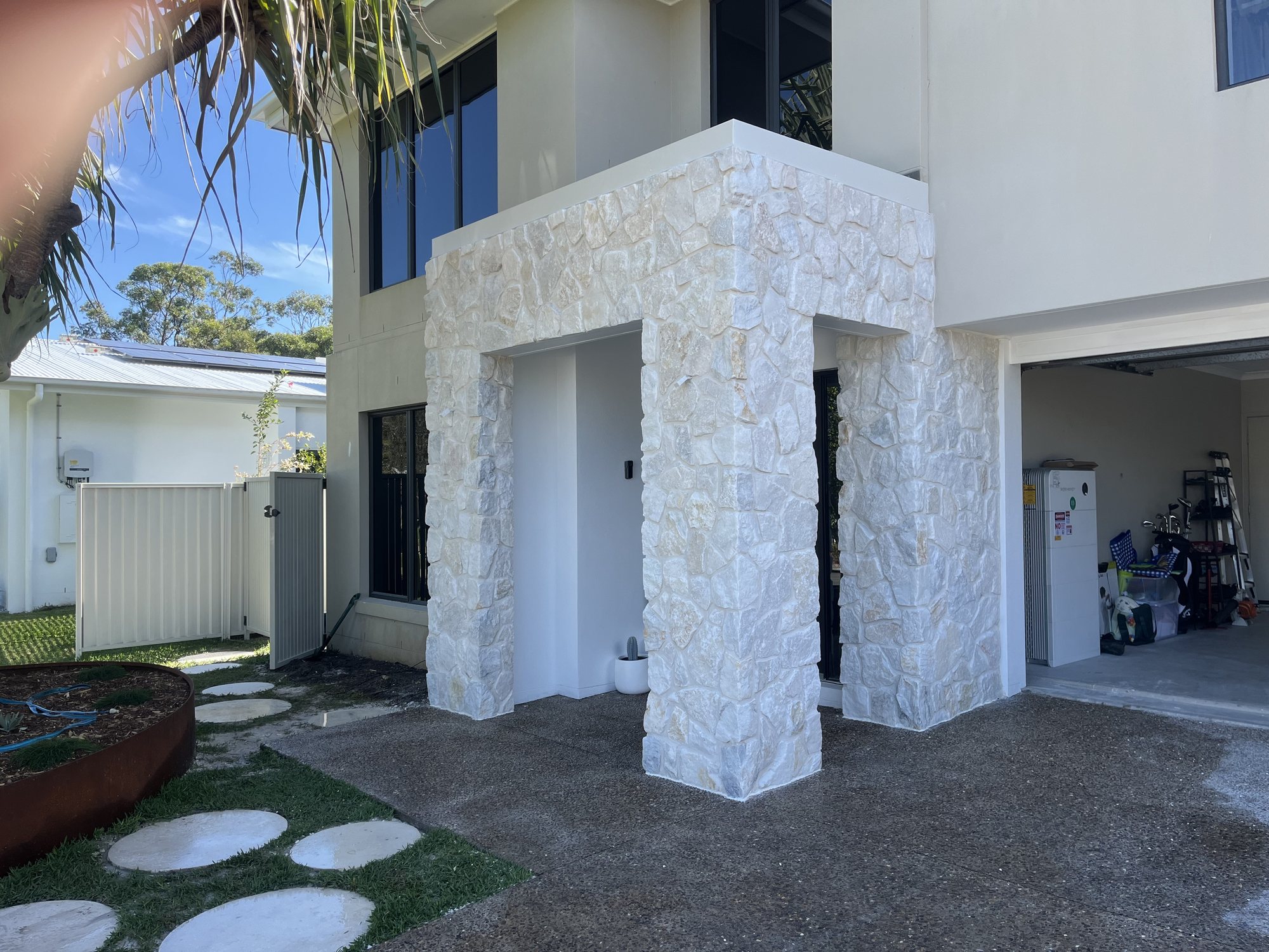 White natural stone clad entry portico - Stone Cladding Sunshine Coast